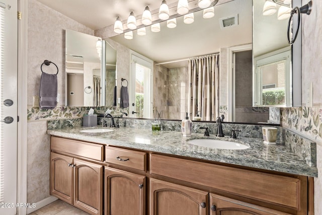 7648 W Mauna Loa Ln, Peoria, AZ 85381 - full bath featuring tile patterned flooring and double vanity