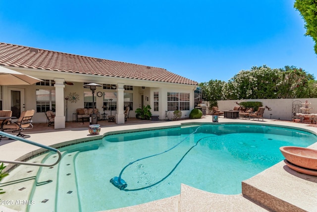 7648 W Mauna Loa Ln, Peoria, AZ 85381 - view of pool with fence, a patio, and an outdoor hangout area