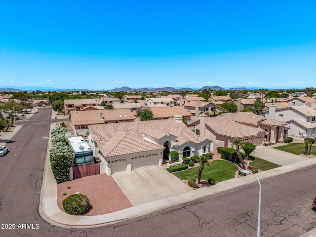 7648 W Mauna Loa Ln, Peoria, AZ 85381 - aerial view of residential area with mountains