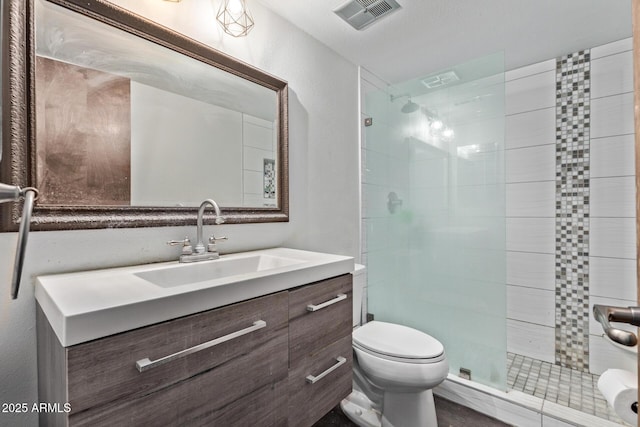 7474 E Earll Dr Unit 311, Scottsdale, AZ 85251 - full bathroom with toilet, a stall shower, and vanity