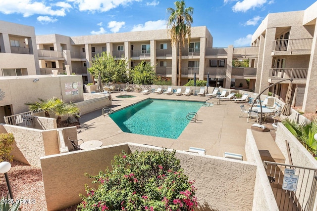 7474 E Earll Dr Unit 311, Scottsdale, AZ 85251 - community pool featuring a patio area
