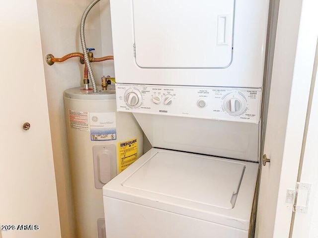 7474 E Earll Dr Unit 311, Scottsdale, AZ 85251 - laundry area featuring stacked washer / dryer and water heater