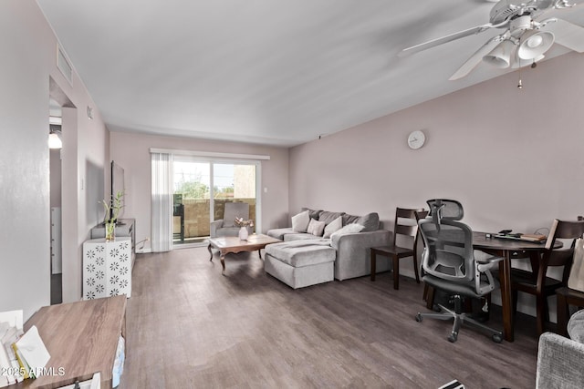 7474 E Earll Dr Unit 311, Scottsdale, AZ 85251 - living area with wood finished floors, a ceiling fan, and a desk