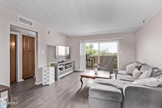 7474 E Earll Dr Unit 311, Scottsdale, AZ 85251 - living area with wood finished floors and baseboards