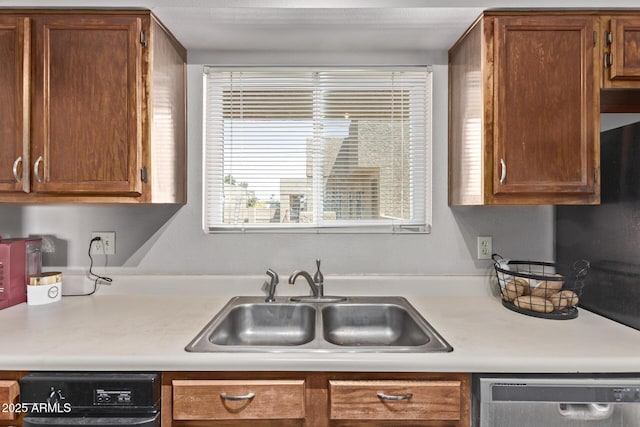 7474 E Earll Dr Unit 311, Scottsdale, AZ 85251 - kitchen featuring a sink, dishwasher, black dishwasher, light countertops, and brown cabinetry