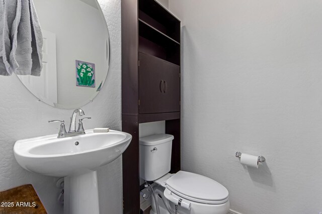 3714 S 58th Dr, Phoenix, AZ 85043 - half bathroom featuring toilet