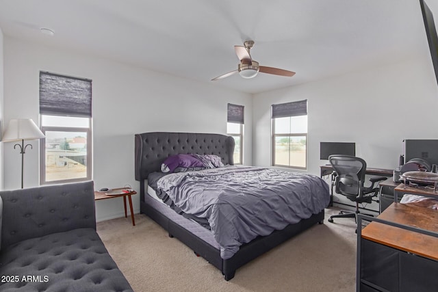 3714 S 58th Dr, Phoenix, AZ 85043 - bedroom with light carpet, a desk, and ceiling fan