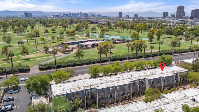 birds eye view of property with a mountain view