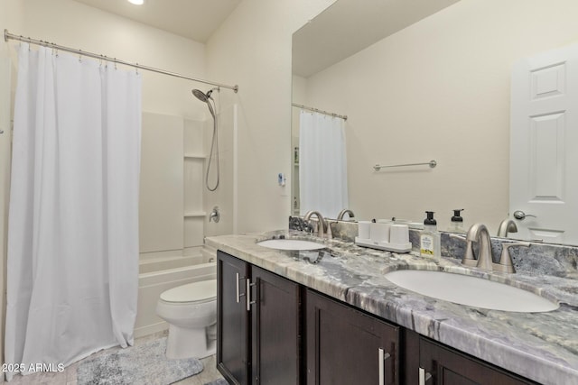 full bathroom featuring vanity, toilet, and shower / bath combo with shower curtain