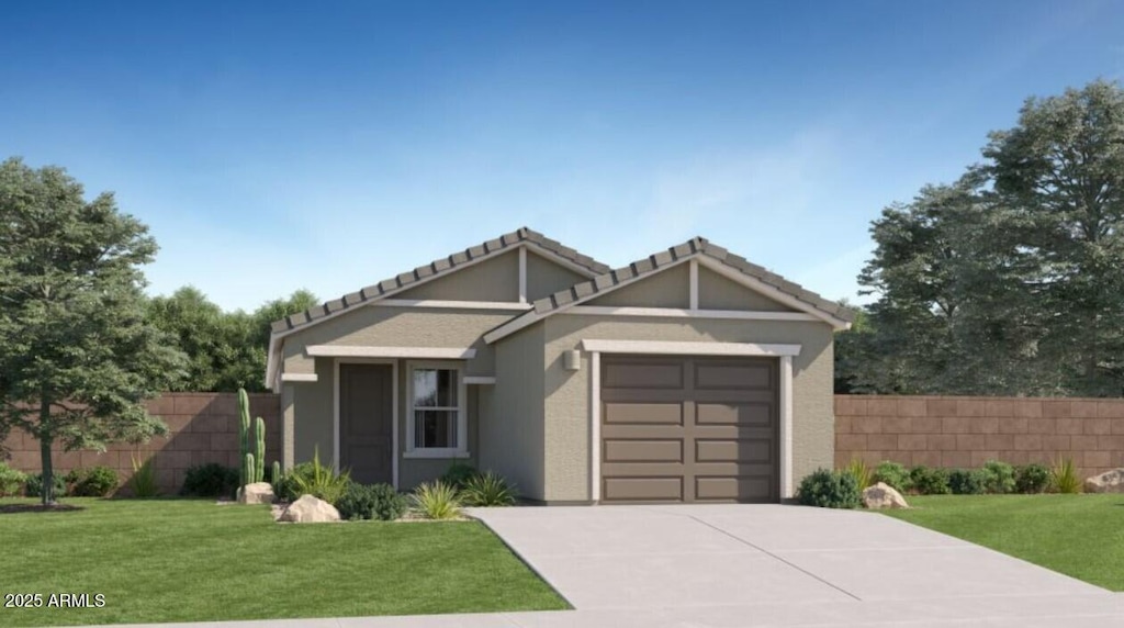 view of front of property with a garage and a front lawn