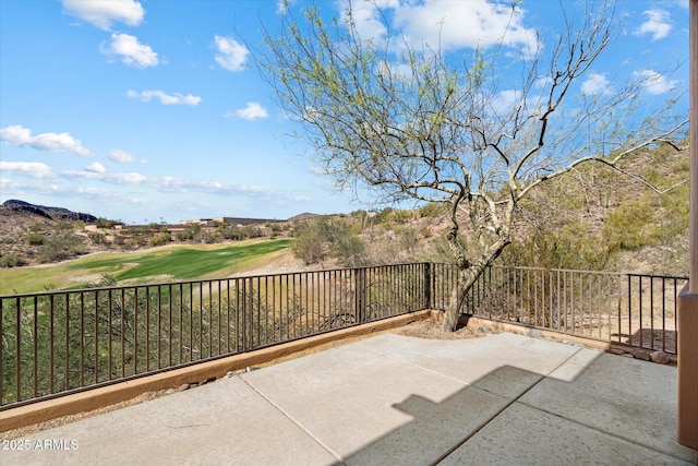 view of patio with view of golf course