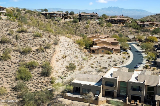 drone / aerial view with a residential view and a mountain view