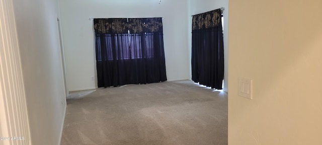 empty room with light carpet