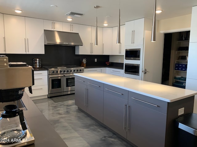 kitchen featuring white cabinets, appliances with stainless steel finishes, tasteful backsplash, and gray cabinetry