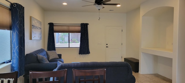 living room featuring ceiling fan