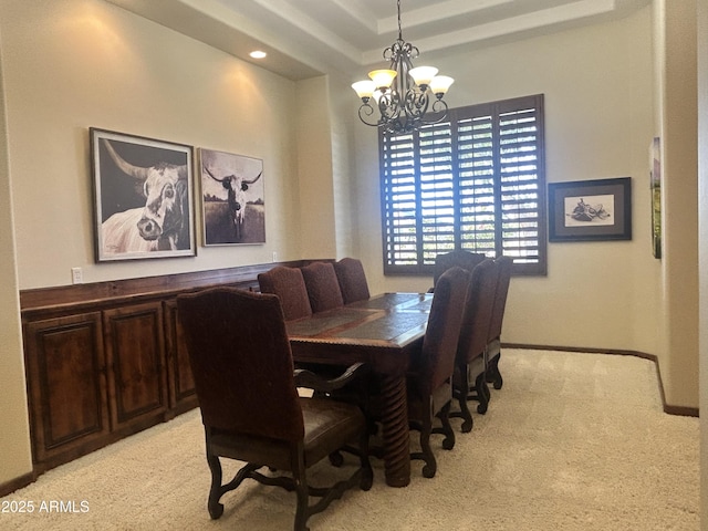 21615 E Pegasus Pkwy, Queen Creek, AZ 85142 - dining space with light colored carpet, baseboards, and a notable chandelier