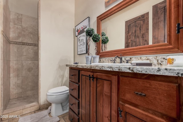 21615 E Pegasus Pkwy, Queen Creek, AZ 85142 - bathroom with tiled shower, vanity, and toilet