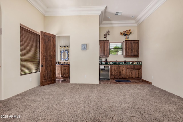 21615 E Pegasus Pkwy, Queen Creek, AZ 85142 - bar featuring carpet floors, ornamental molding, visible vents, and wine cooler