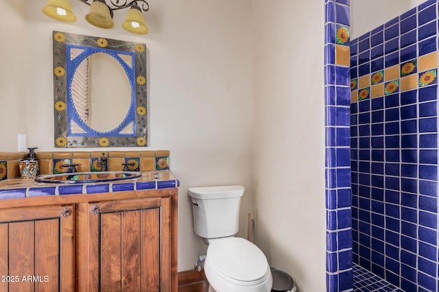21615 E Pegasus Pkwy, Queen Creek, AZ 85142 - full bathroom featuring toilet, vanity, and tiled shower