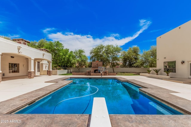 21615 E Pegasus Pkwy, Queen Creek, AZ 85142 - view of swimming pool with a patio area, a fenced in pool, and a diving board