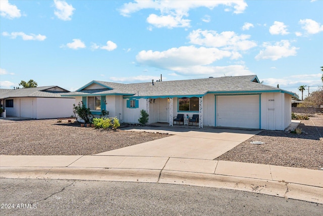 ranch-style home with a garage