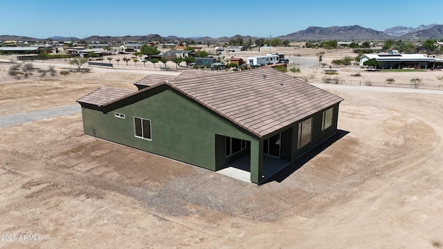 37478 W Hayes St, Tonopah, AZ 85354 - view of side of property with a mountain view and stucco siding