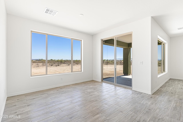 37478 W Hayes St, Tonopah, AZ 85354 - unfurnished room featuring light wood-style flooring and baseboards