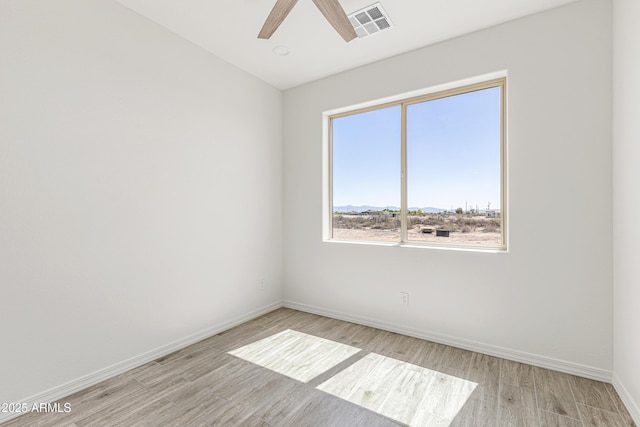 37478 W Hayes St, Tonopah, AZ 85354 - empty room with light wood-type flooring and a ceiling fan