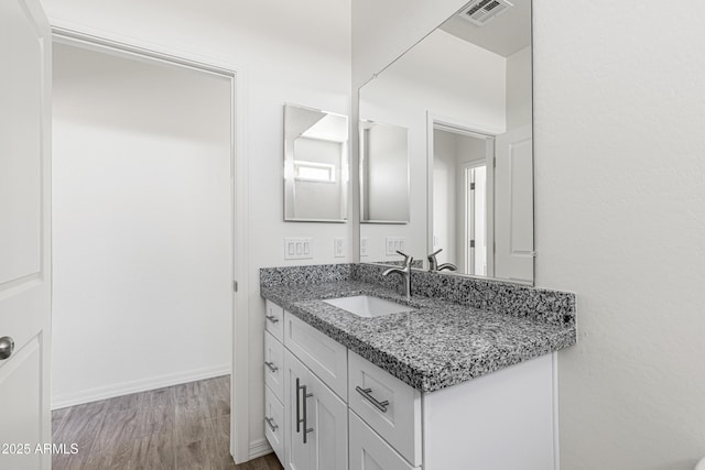 37478 W Hayes St, Tonopah, AZ 85354 - bathroom featuring vanity and wood finished floors