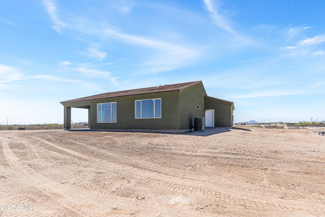37478 W Hayes St, Tonopah, AZ 85354 - view of side of home featuring driveway and stucco siding