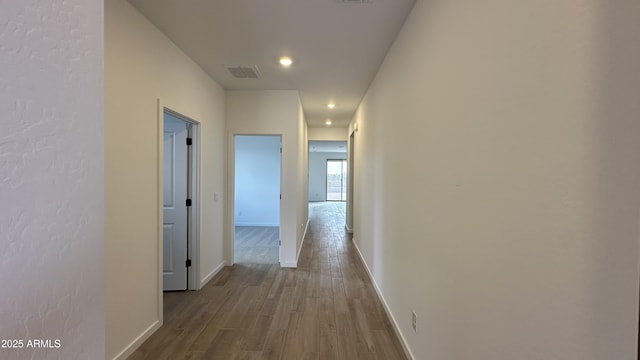 hall featuring light hardwood / wood-style floors