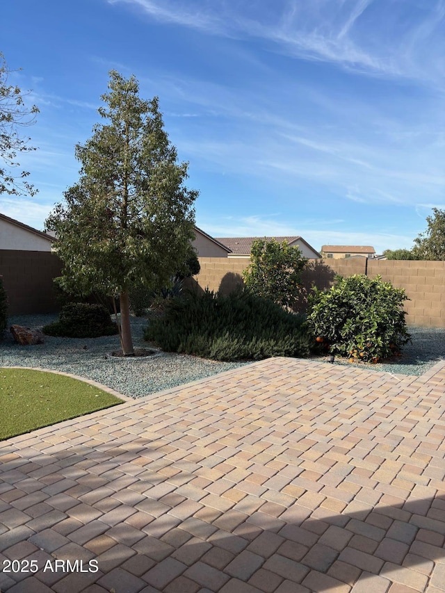 view of patio with fence