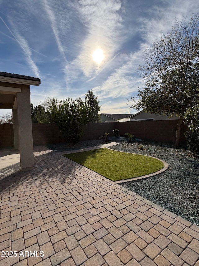 view of patio featuring a fenced backyard