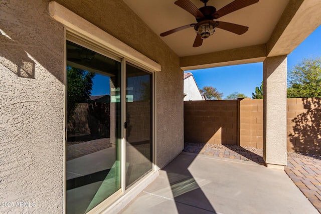 view of patio with a ceiling fan and a fenced backyard