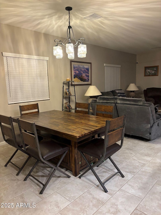 dining space with visible vents