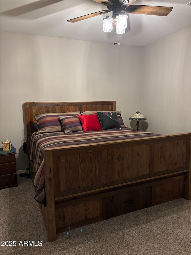 carpeted bedroom with a ceiling fan