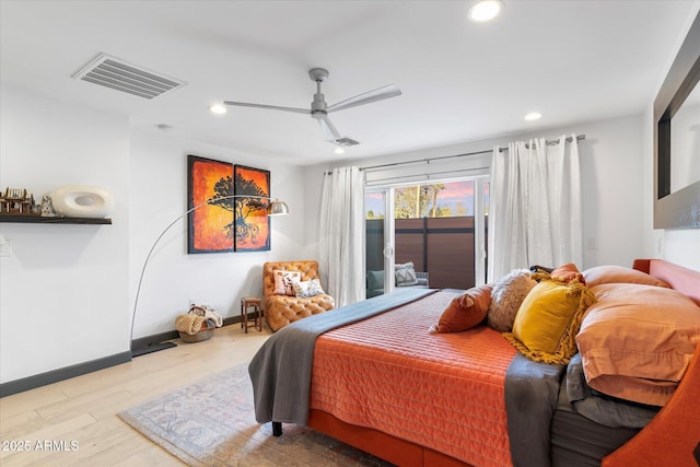 bedroom featuring recessed lighting, visible vents, wood finished floors, access to outside, and baseboards