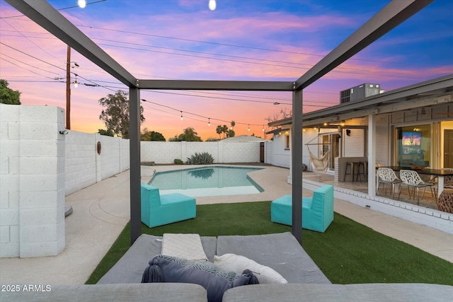 view of swimming pool with a patio area, a fenced backyard, and a fenced in pool