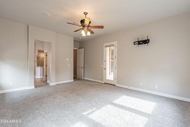 unfurnished bedroom featuring ceiling fan and light colored carpet