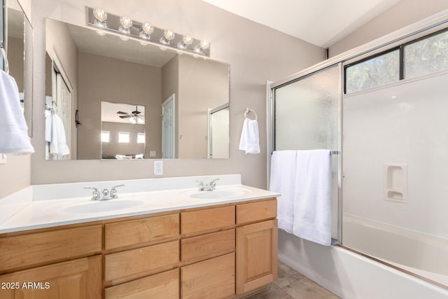 3041 E Fremont Rd, Phoenix, AZ 85042 - bathroom with double vanity, bath / shower combo with glass door, and a ceiling fan