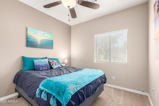 3041 E Fremont Rd, Phoenix, AZ 85042 - carpeted bedroom featuring baseboards and a ceiling fan