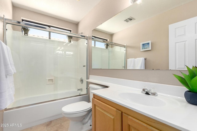 3041 E Fremont Rd, Phoenix, AZ 85042 - full bathroom featuring vanity, enclosed tub / shower combo, and tile patterned flooring