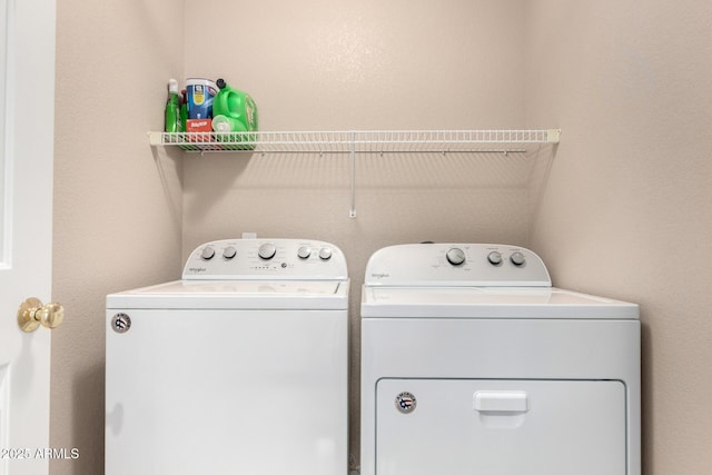 3041 E Fremont Rd, Phoenix, AZ 85042 - laundry room with washing machine and clothes dryer