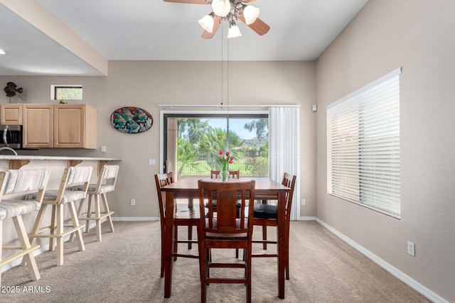 3041 E Fremont Rd, Phoenix, AZ 85042 - dining area with a ceiling fan and light colored carpet