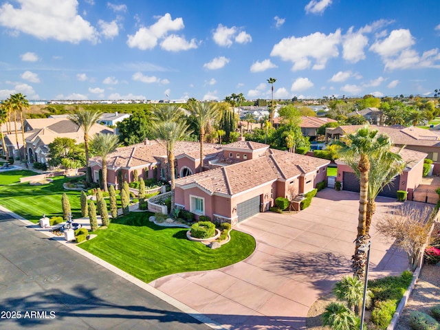 birds eye view of property with a residential view