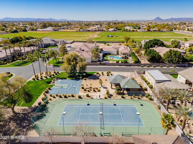 drone / aerial view with a residential view and a mountain view