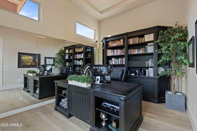 office with light wood finished floors and baseboards