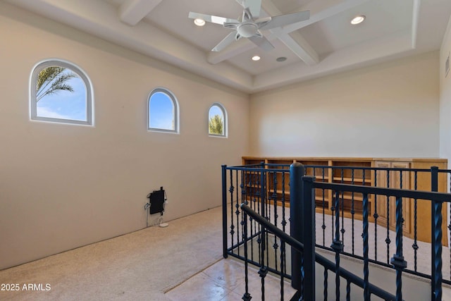 hall featuring light carpet, coffered ceiling, beamed ceiling, and recessed lighting