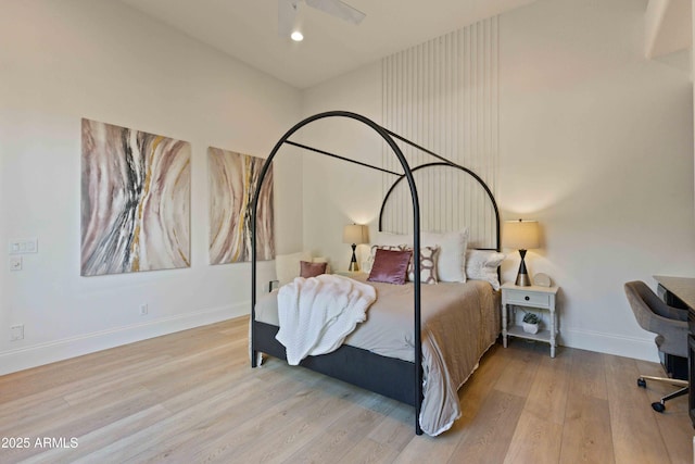 bedroom featuring recessed lighting, wood finished floors, and baseboards