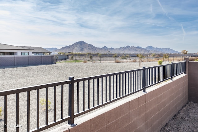 balcony featuring a mountain view